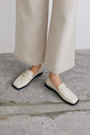 
                  
                    Perth Penny Loafers in Glazed Cream
                  
                