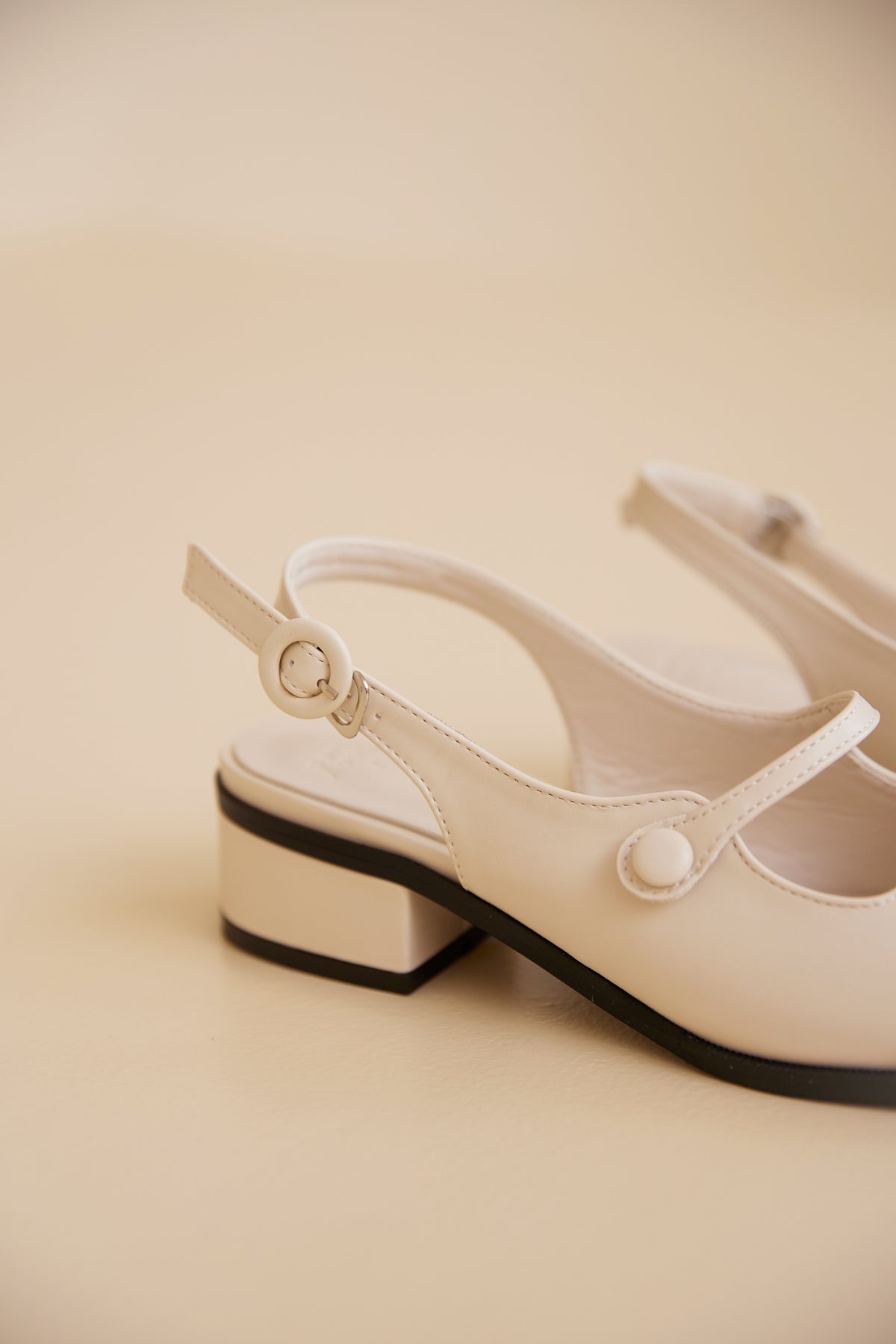 Aeira Mary Jane Heels in Cream