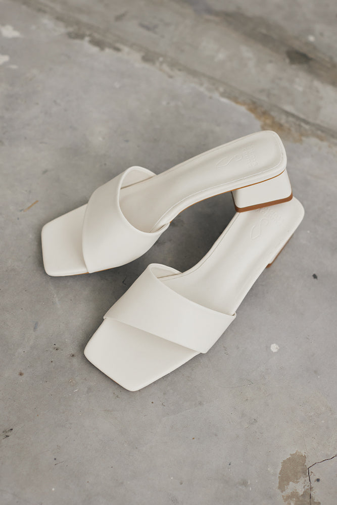 
                  
                    Carly Irregular Strap Heels in Ivory
                  
                