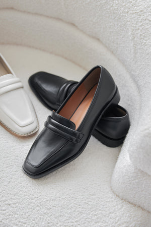 
                  
                    Kelly Puffy Loafers in Black
                  
                