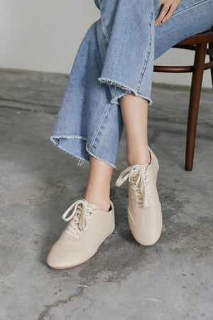 
                  
                    Kennedy Pebbled Sneakers in Taupe
                  
                