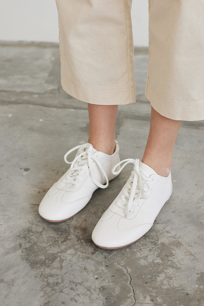 
                  
                    Kennedy Pebbled Sneakers in White
                  
                