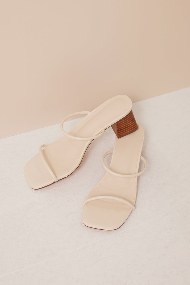 
                  
                    Lerae Strappy Wooden Heels in Ivory
                  
                