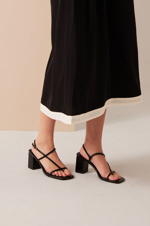 
                  
                    Mattea Strappy Sandals in Black
                  
                