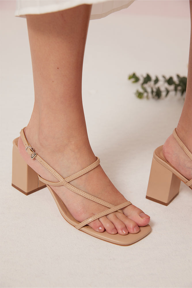 
                  
                    Mattea Strappy Sandals in Nude
                  
                