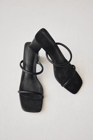 
                  
                    Melo Strappy Heels in Black
                  
                