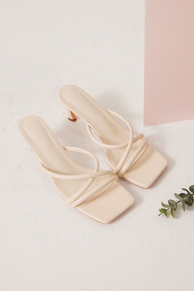 
                  
                    Miki Strappy Heels in Ivory
                  
                