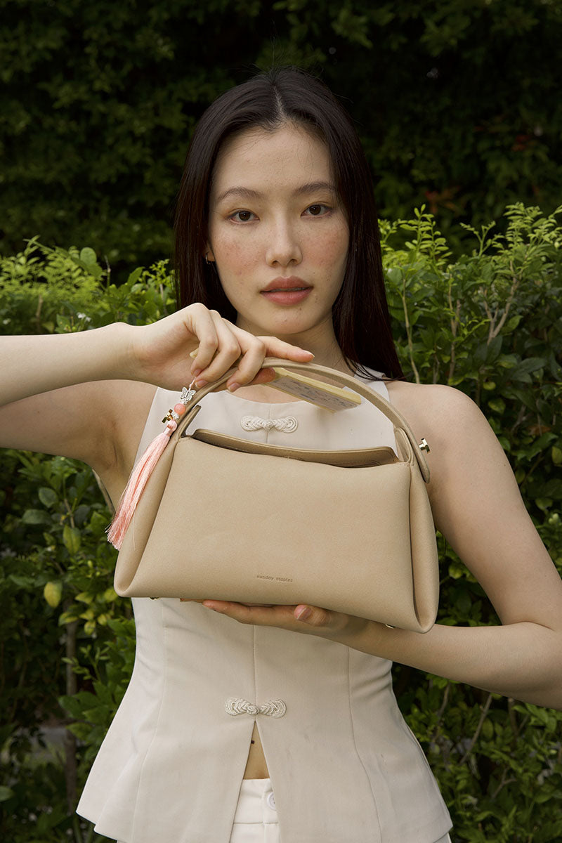 Milan 28 Waterproof Suede Top-handle Bag in Desert