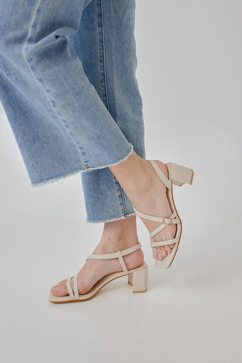 Orla Strappy Buckle Heels in Cream