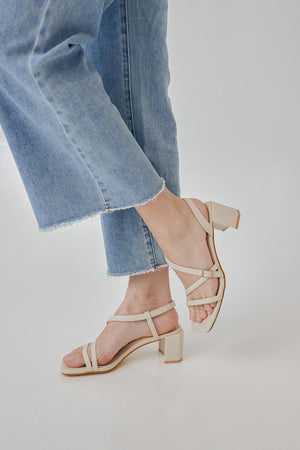 
                  
                    Orla Strappy Buckle Heels in Cream
                  
                
