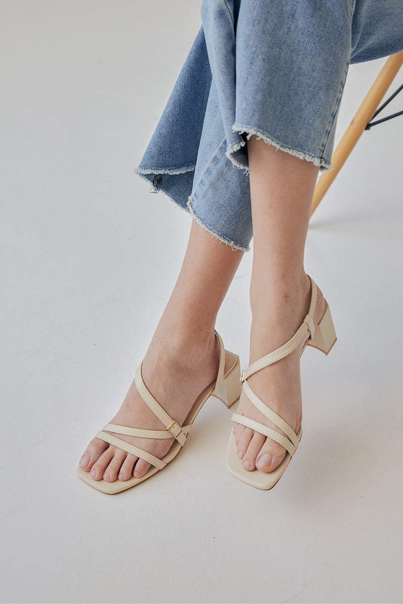 Orla Strappy Buckle Heels in Cream