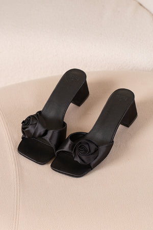 
                  
                    Pippa Satin Flower Heels in Black
                  
                