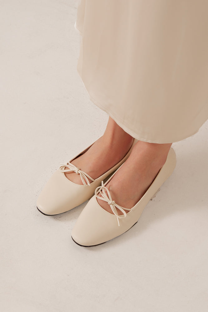 
                  
                    Quilla Knotted Maryjane Flats in Ivory
                  
                