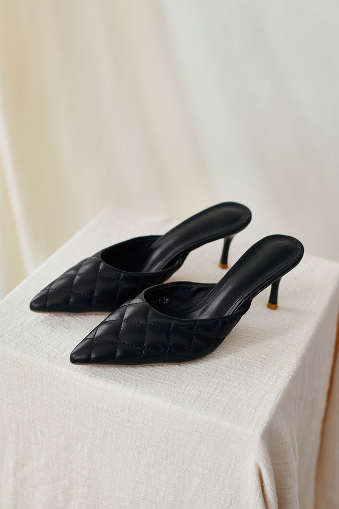 
                  
                    Opal Puffy Quilted Mules in Black
                  
                