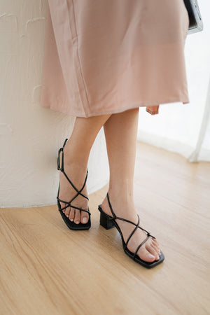 
                  
                    Delphine Strappy Sandals in Black
                  
                