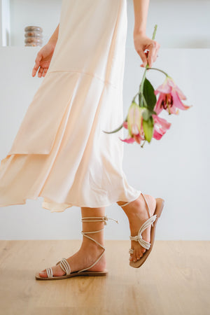 
                  
                    Nydah Tie-around Strappy Sandals in Cream
                  
                