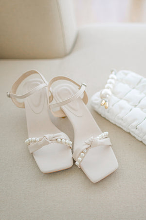 
                  
                    Odessa Pearl Knot Heeled Sandals in Cream
                  
                