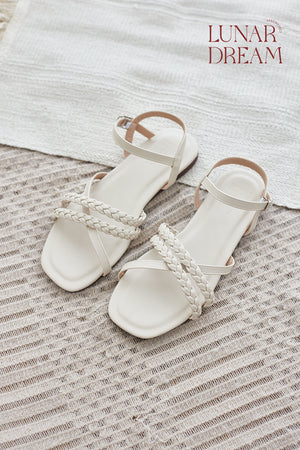 
                  
                    Carmeen Braided Flat Sandals in Cream
                  
                