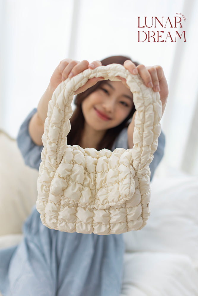 
                  
                    Mochi Pillow Bag in Cream
                  
                